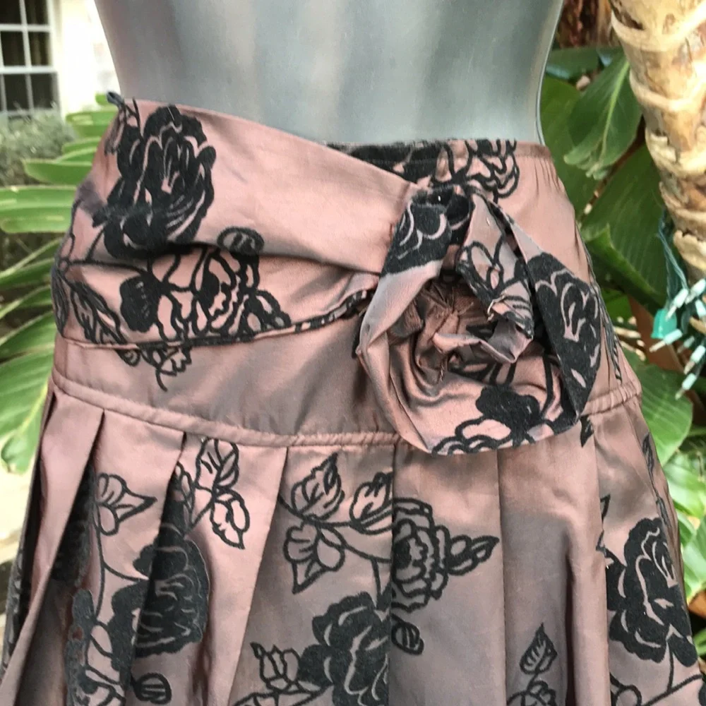 Metallic bronze dark floral bubble skirt with velvet rosette